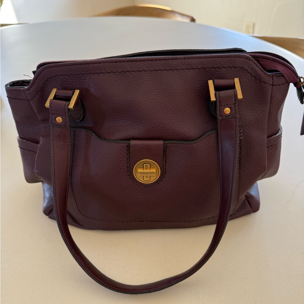 Rosetta shoulder bag. 16 x 10 1/2 excellent condition dark burgundy.